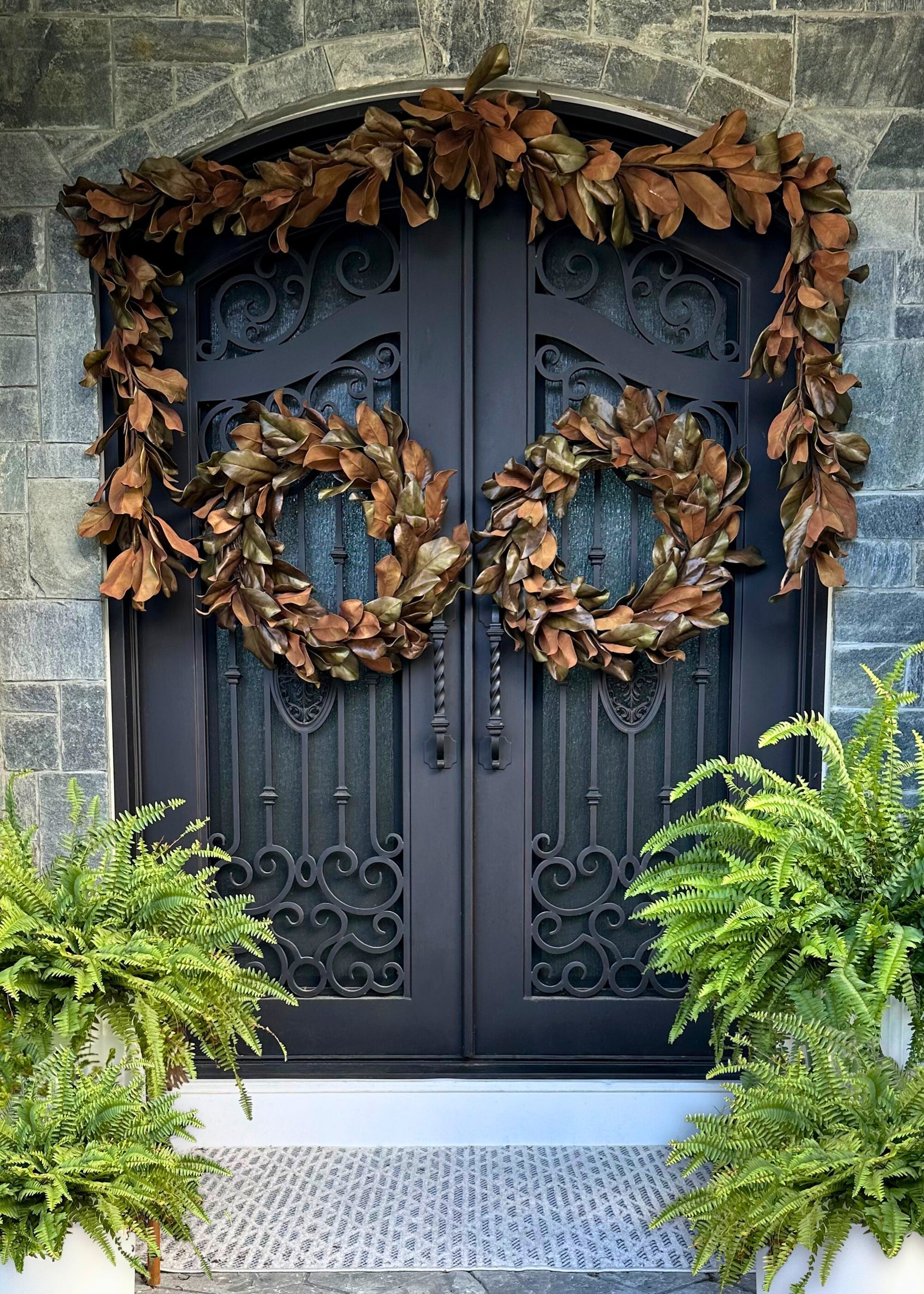 Deluxe Natural Touch Faux Magnolia Leaf Garland in Aged Brown- 79.5"